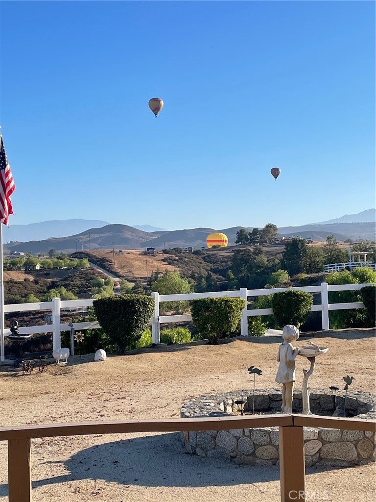 39597 Calle Escalona Temecula, CA 92592 - Photo 3 of 61 a view of a terrace with wooden floor
