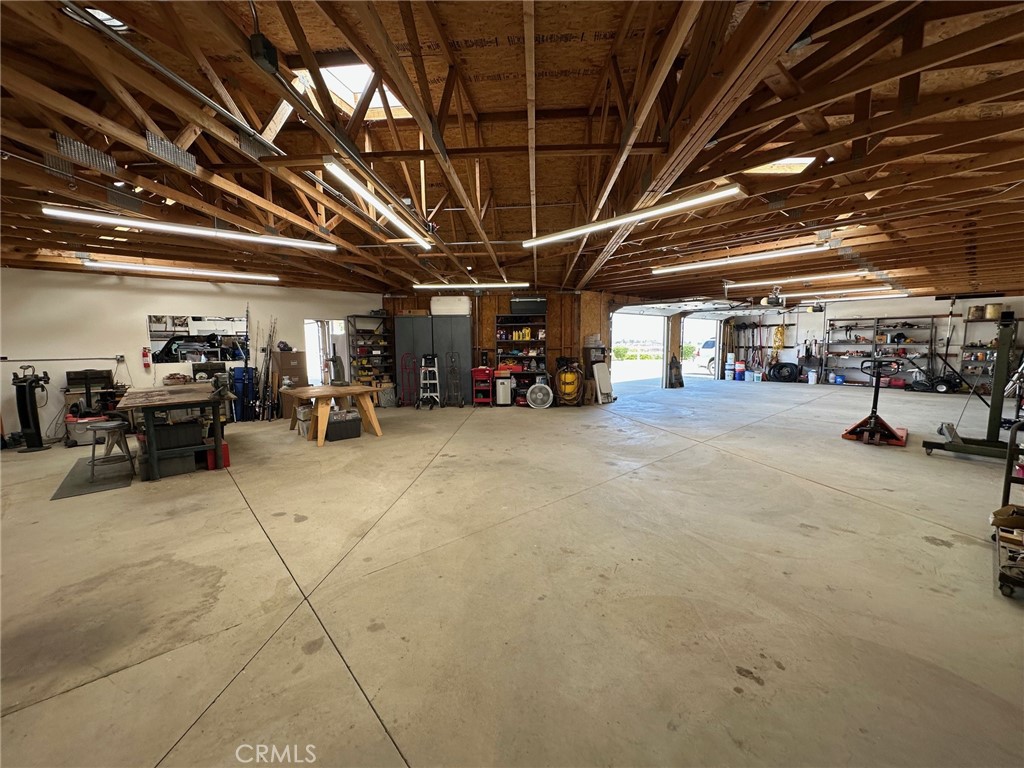 39597 Calle Escalona Temecula, CA 92592 - Photo 41 of 61 a view of parking garage with cars