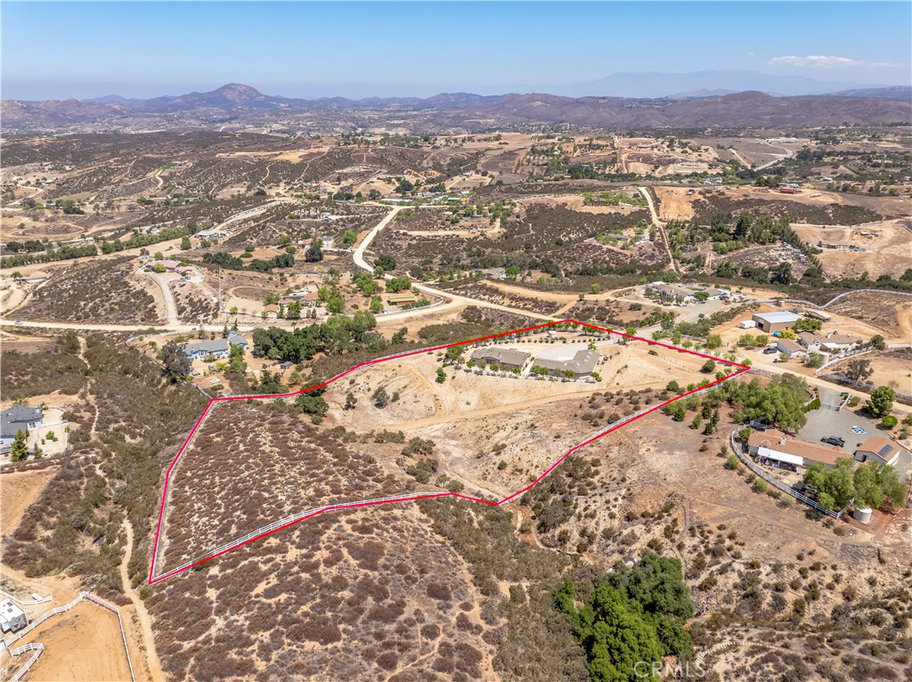39597 Calle Escalona Temecula, CA 92592 - Photo 52 of 61 an aerial view of residential houses with outdoor space