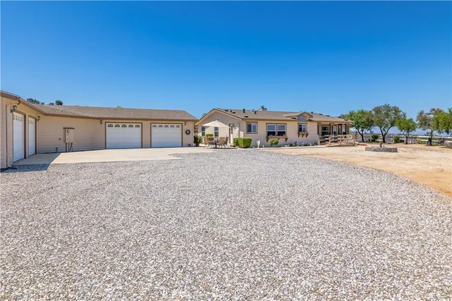 a view of a balcony with wooden floor