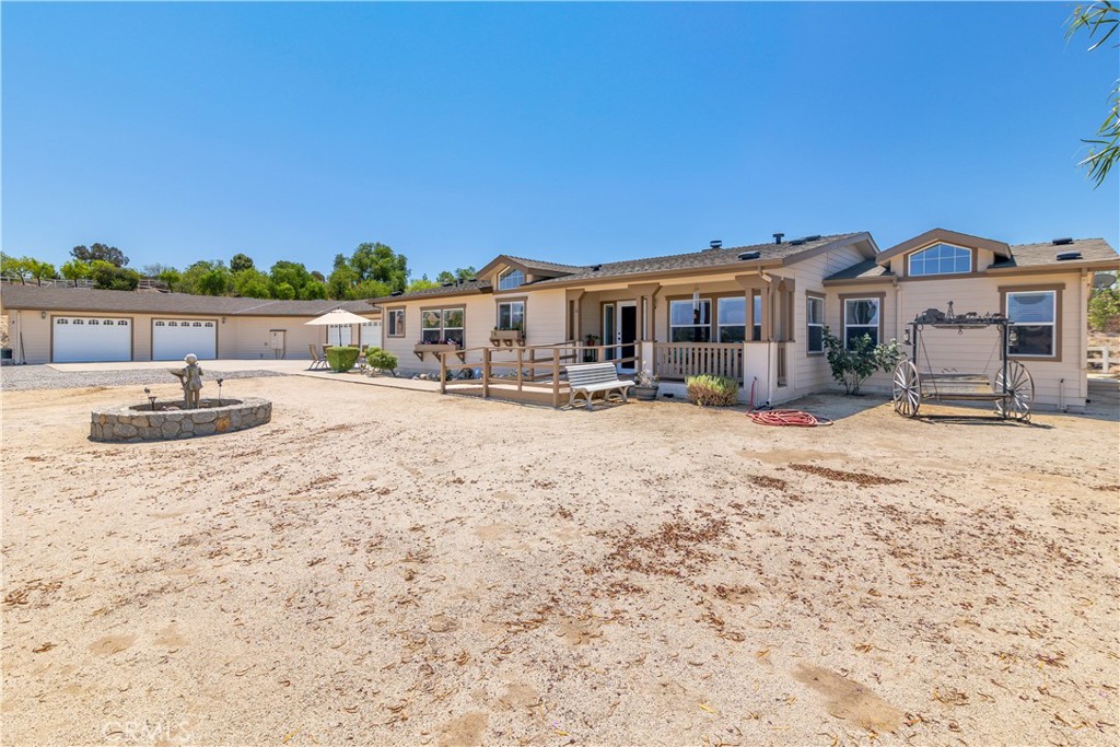 39597 Calle Escalona Temecula, CA 92592 - Photo 7 of 61 a view of a house with a yard