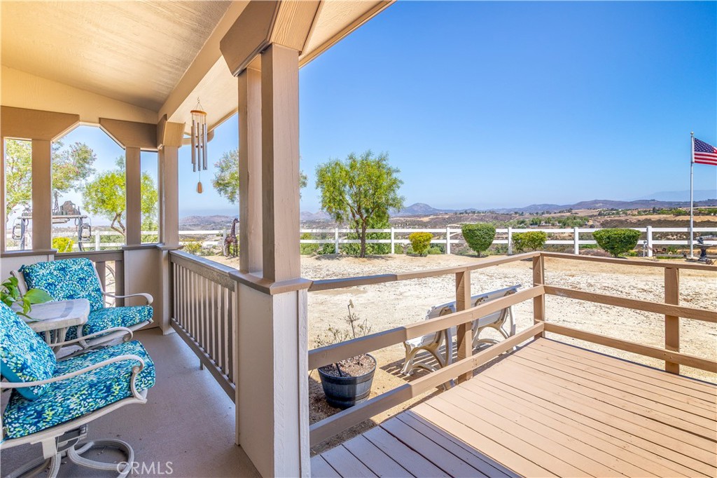39597 Calle Escalona Temecula, CA 92592 - Photo 8 of 61 a view of a balcony with wooden floor