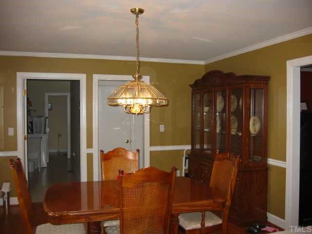 760 Mitchell Road Angier, NC 27501 - Photo 5 of 12 a dining room with furniture