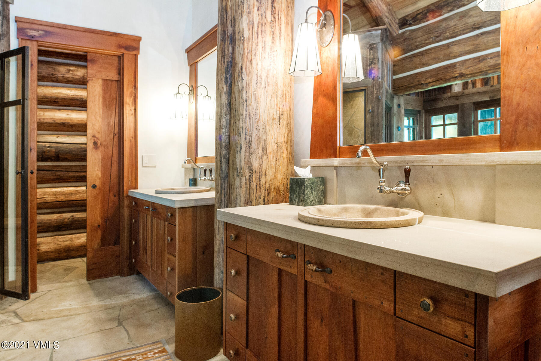2291 Daybreak Ridge Road Avon, CO 81620 - Photo 31 of 56 a bathroom with a sink and a mirror