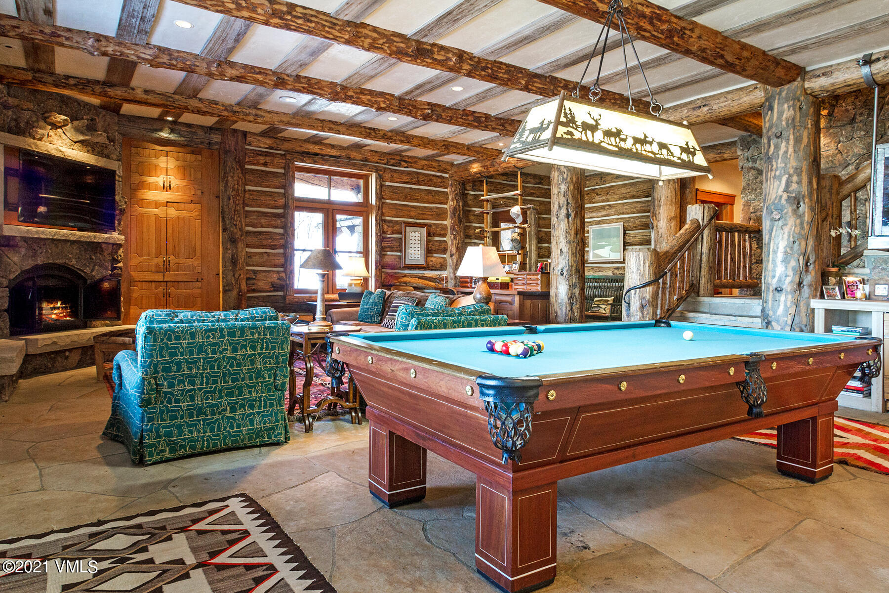 2291 Daybreak Ridge Road Avon, CO 81620 - Photo 33 of 56 a room with pool table and windows