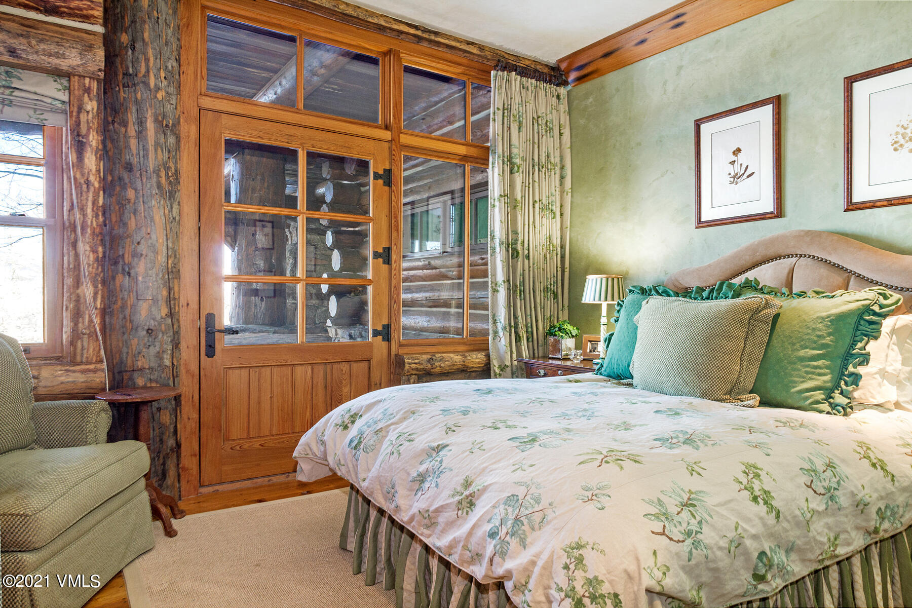 2291 Daybreak Ridge Road Avon, CO 81620 - Photo 45 of 56 a bedroom with a bed and a painting on the wall