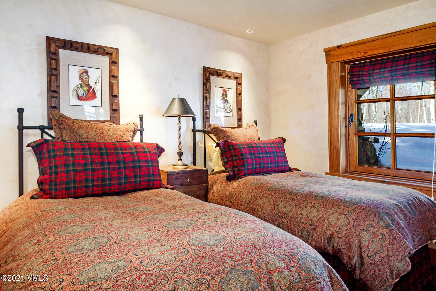 2291 Daybreak Ridge Road Avon, CO 81620 - Photo 47 of 56 a bedroom with two beds and a large window