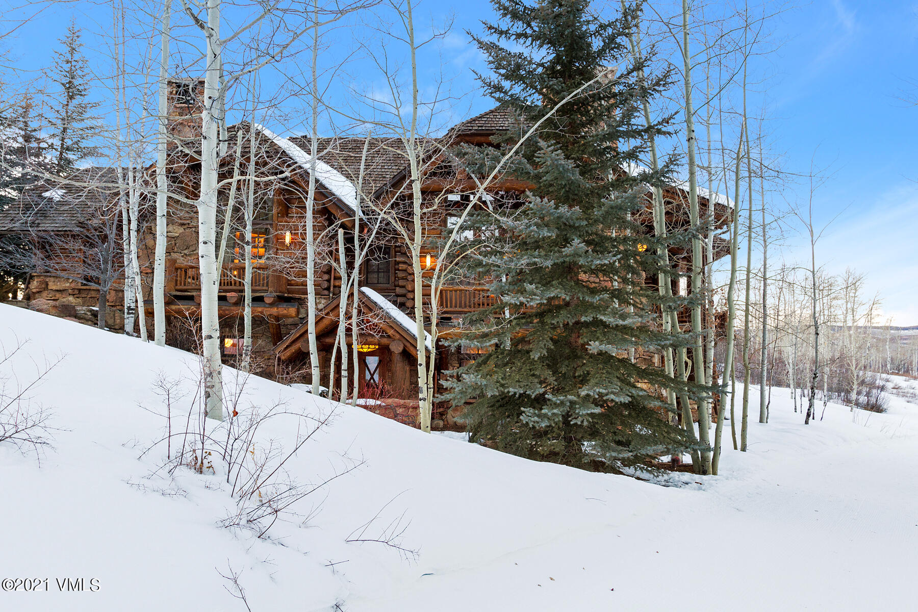 2291 Daybreak Ridge Road Avon, CO 81620 - Photo 51 of 56 a view of a house with a snow in the background
