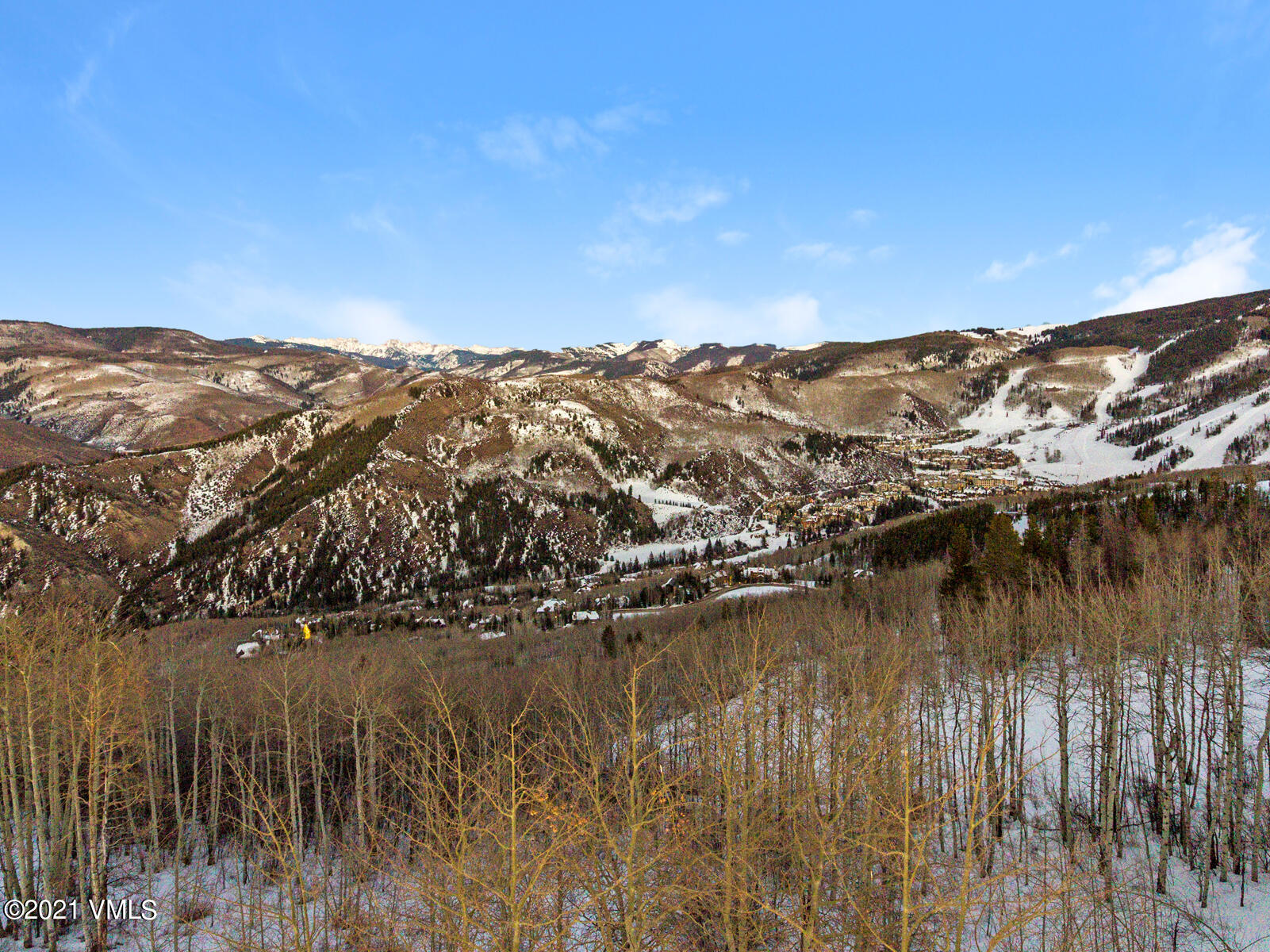 2291 Daybreak Ridge Road Avon, CO 81620 - Photo 52 of 56 a view of a lake with mountains in the background