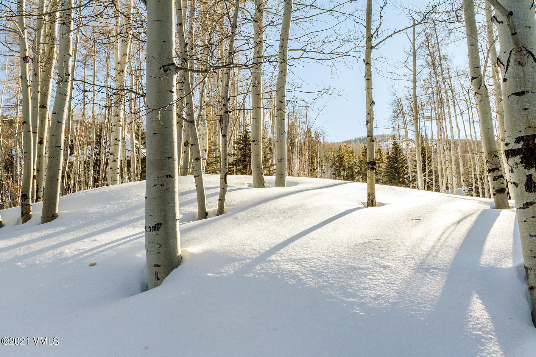 2291 Daybreak Ridge Road Avon, CO 81620 - Photo 53 of 56 a view of a road with a building in the background