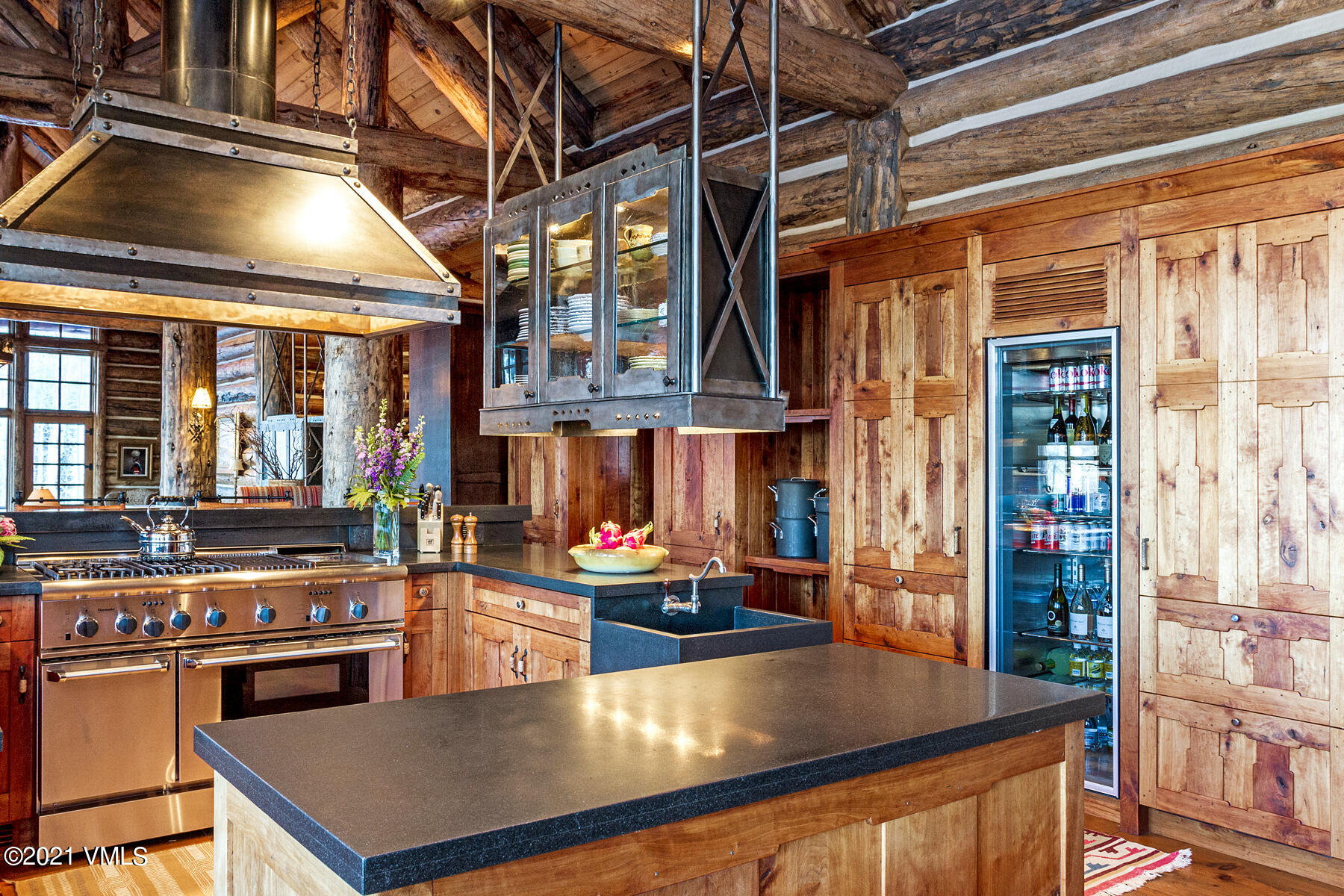 2291 Daybreak Ridge Road Avon, CO 81620 - Photo 8 of 56 a kitchen with stainless steel appliances granite countertop a stove and a refrigerator