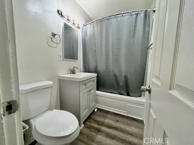 686 East Cottonwood Road, Unit 7 Palm Springs, CA 92262 - Photo 12 of 19 a bathroom with a sink a toilet a mirror and shower