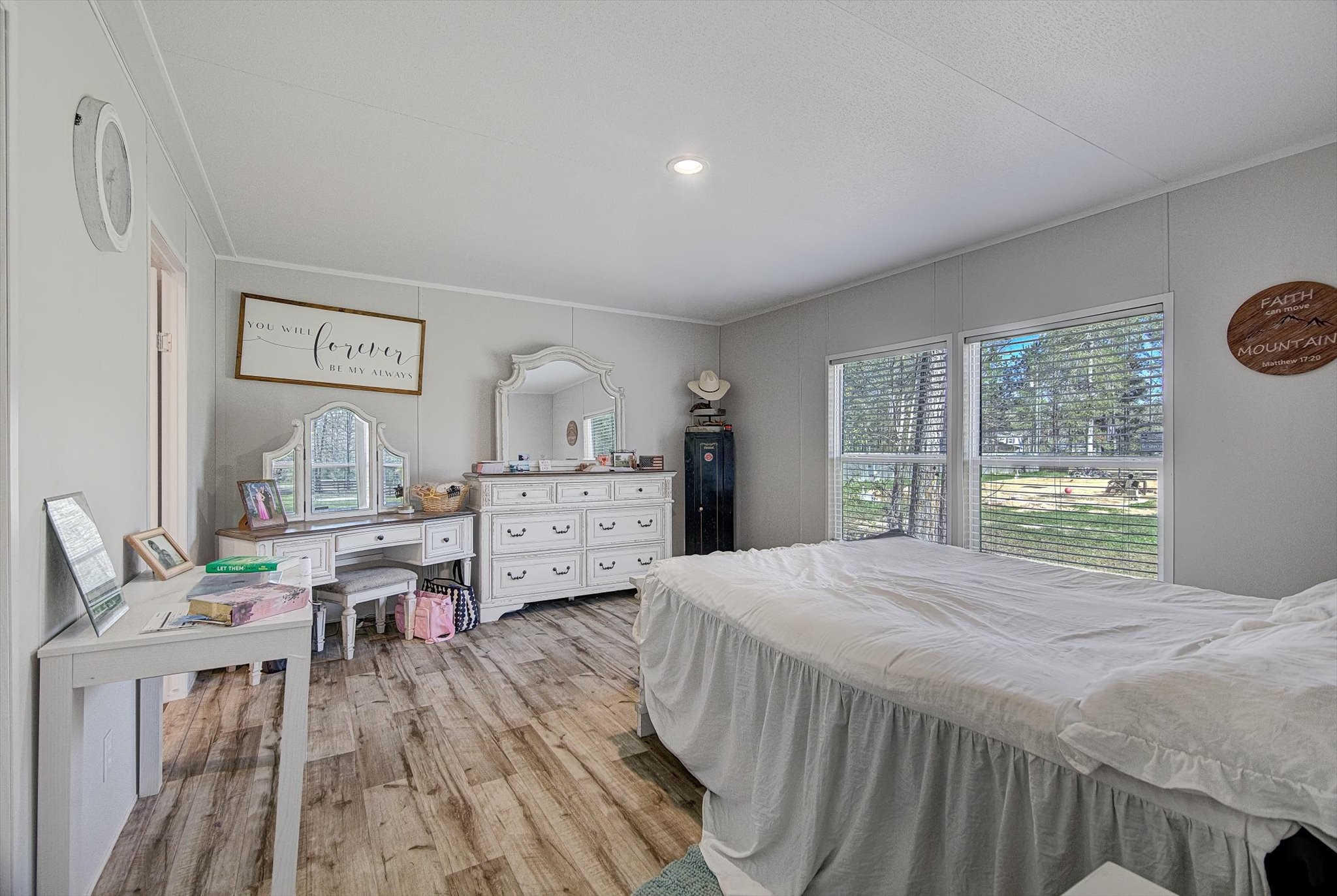 650 County Road 2219 Cleveland, TX 77327 - Photo 13 of 39 a bedroom with a bed and a large window