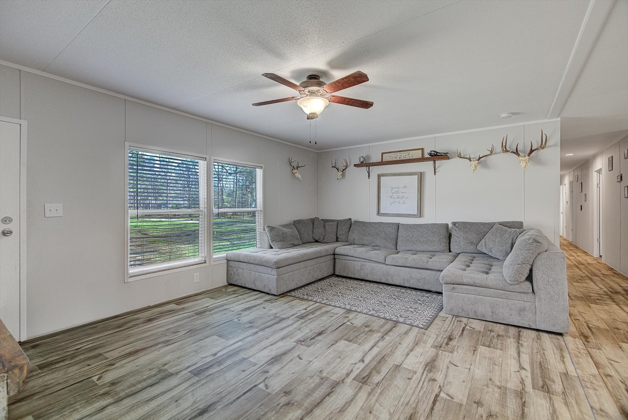 650 County Road 2219 Cleveland, TX 77327 - Photo 5 of 39 a living room with furniture and a large window