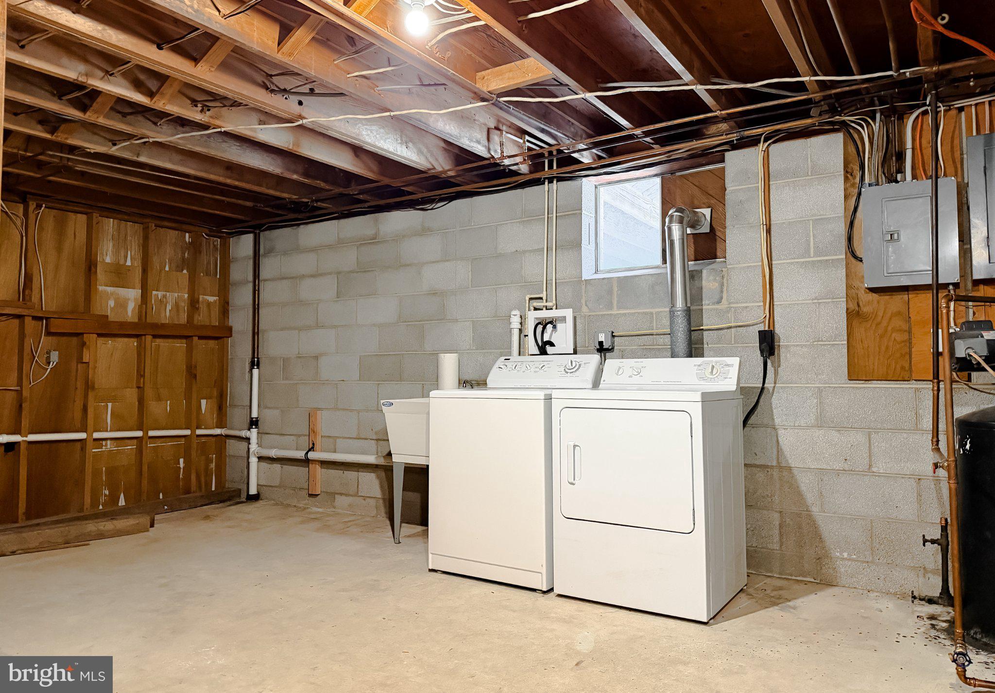 23230 Colton Point Road Avenue, MD 20609 - Photo 49 of 63 Spacious basement laundry area.
