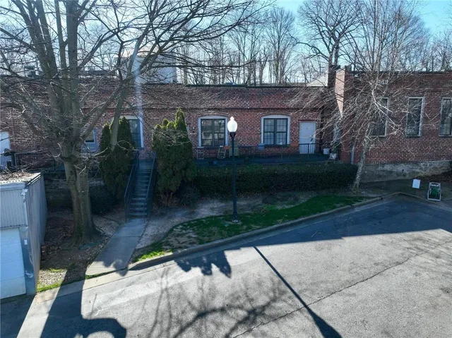 a view of house with yard