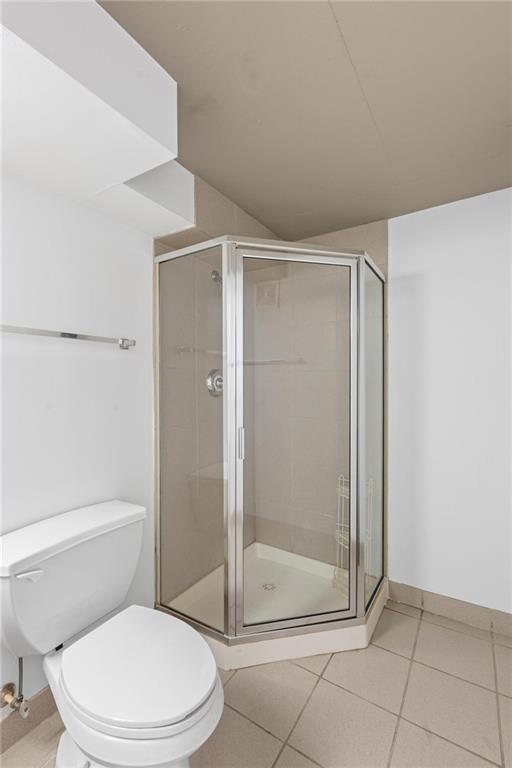 644 Wells Street Southwest, Unit 10 Atlanta, GA 30310 - Photo 30 of 46 a bathroom with a shower a toilet and a sink