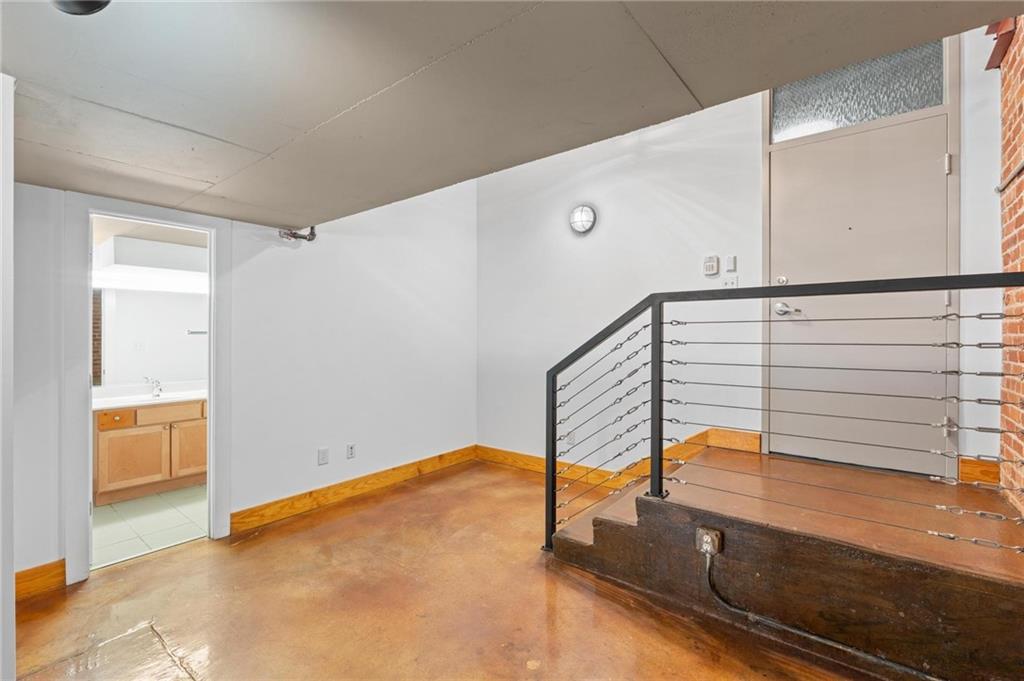 644 Wells Street Southwest, Unit 10 Atlanta, GA 30310 - Photo 33 of 46 a view of a room with wooden floor