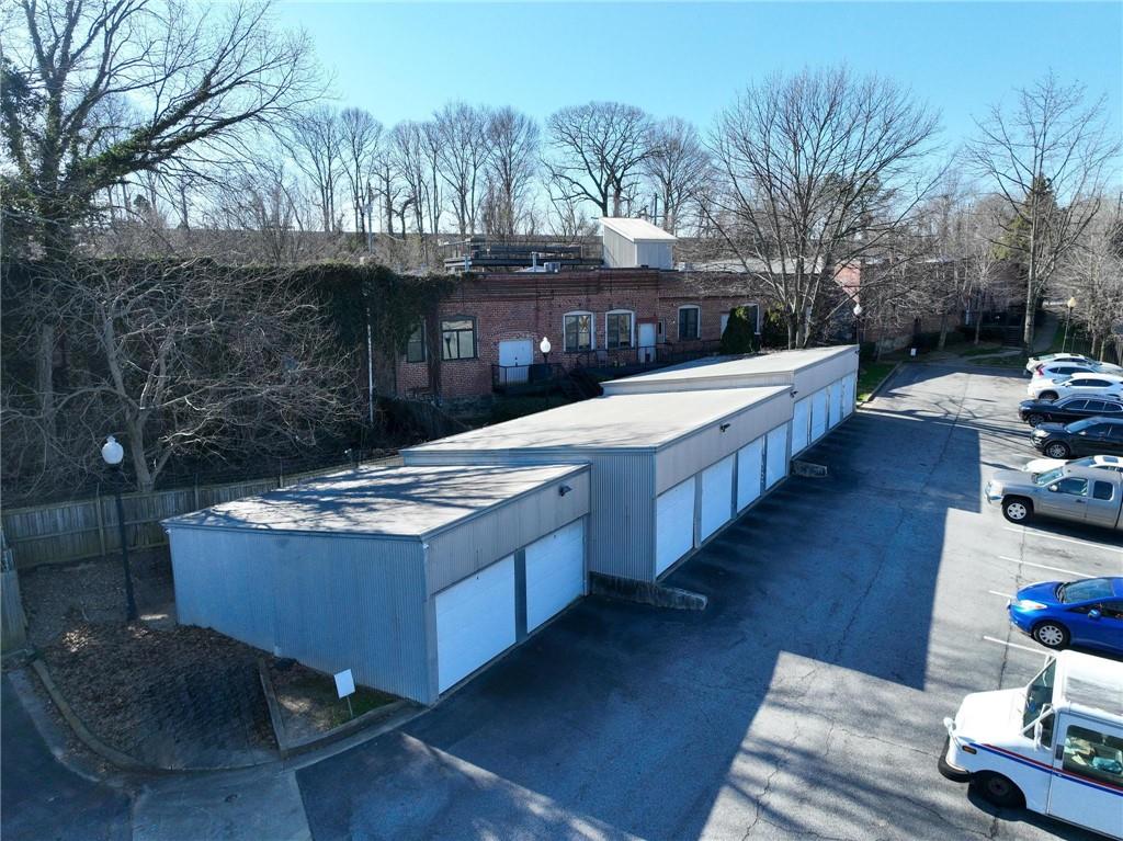 644 Wells Street Southwest, Unit 10 Atlanta, GA 30310 - Photo 42 of 46 a view of a house with backyard wooden fence and trees
