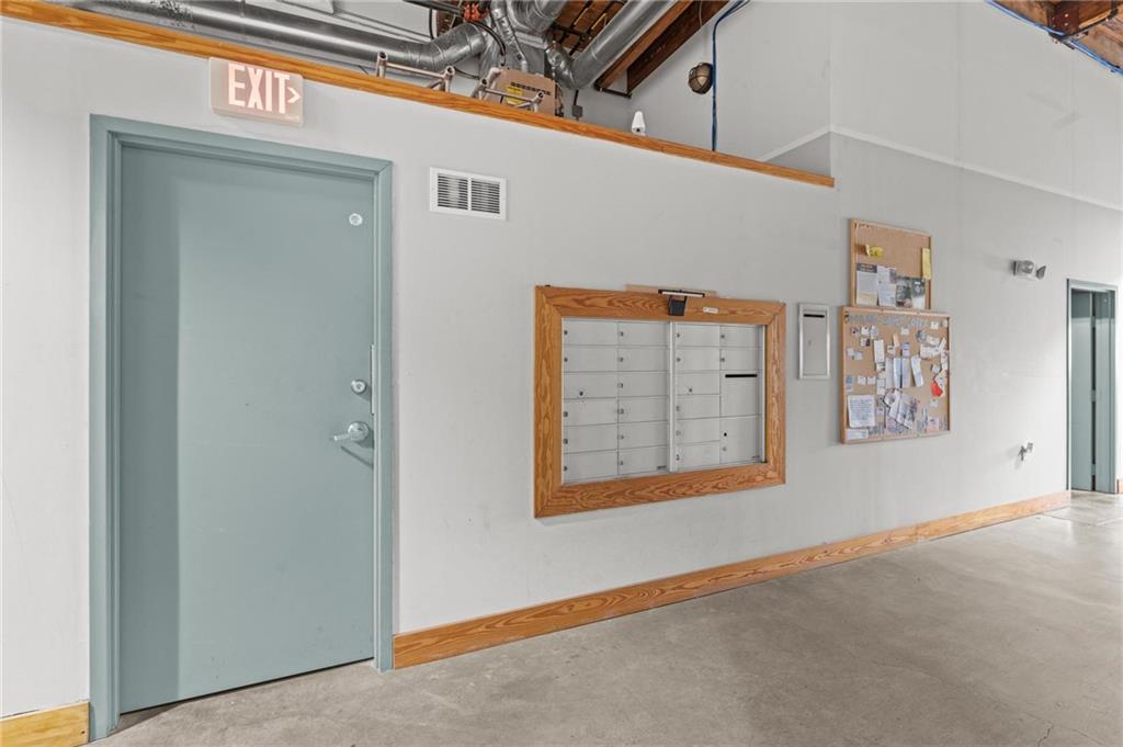 644 Wells Street Southwest, Unit 10 Atlanta, GA 30310 - Photo 6 of 46 a view of a hallway with a large window
