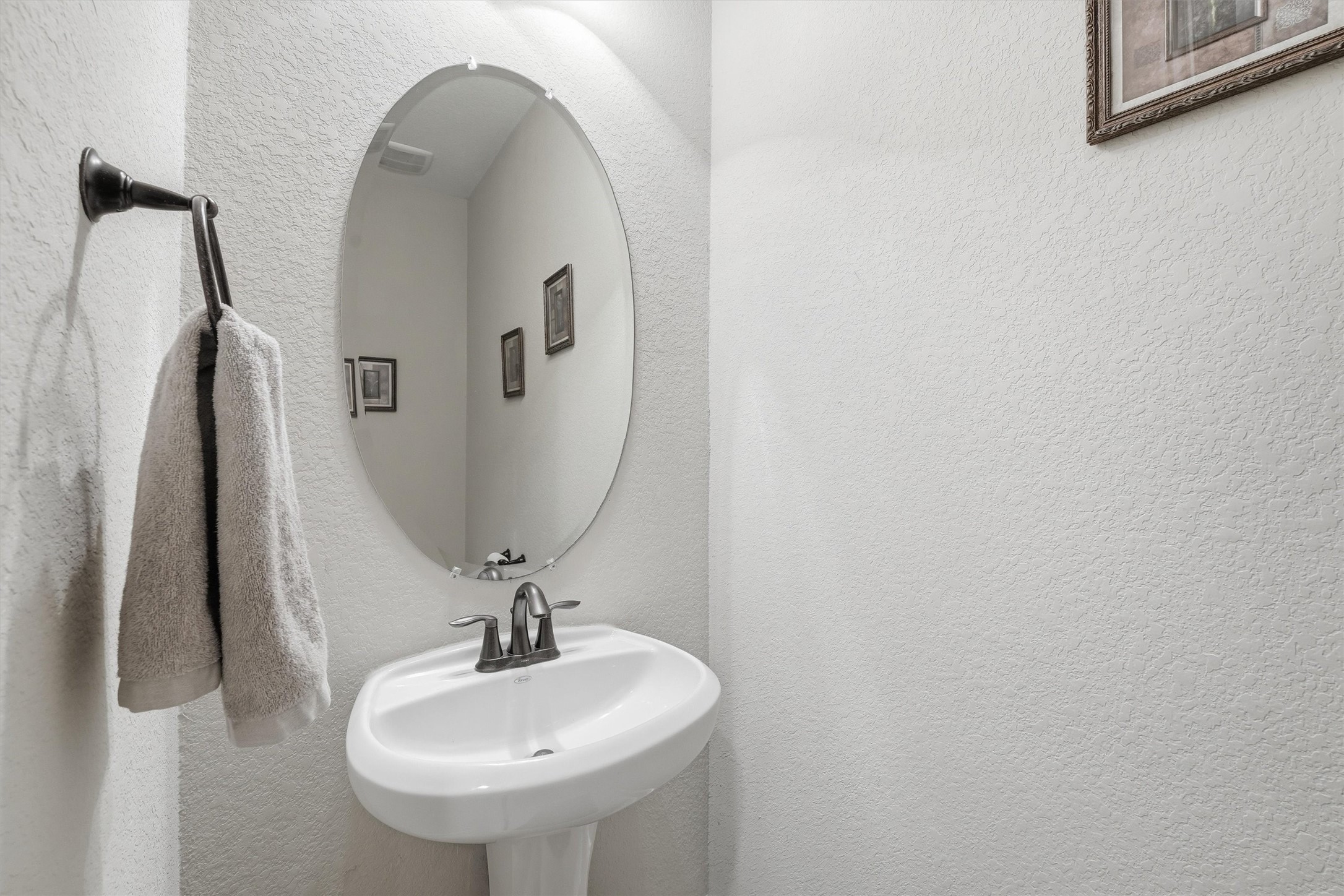 12506 Northpointe Ridge Lane Tomball, TX 77377 - Photo 13 of 31 a bathroom with a sink and mirror