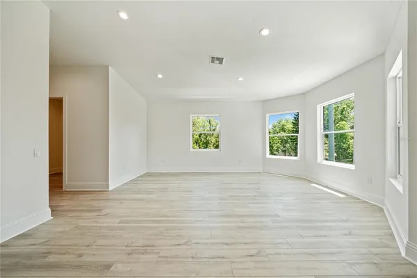 an empty room with windows