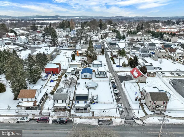a aerial view of a houses with city view