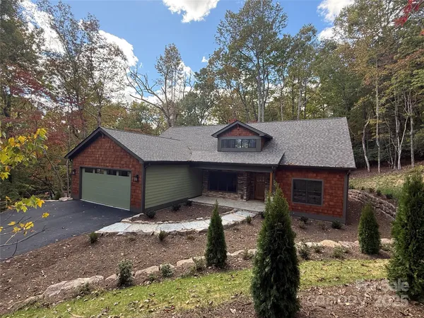 a house view with a outdoor space