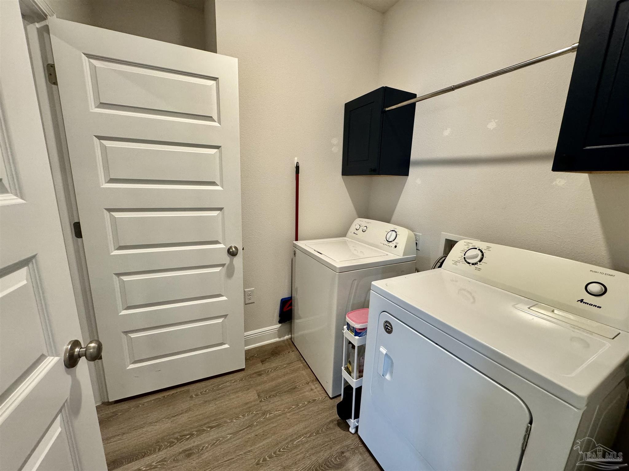 7787 Burnside Loop Pensacola, FL 32526 - Photo 16 of 32 a utility room with dryer and washer