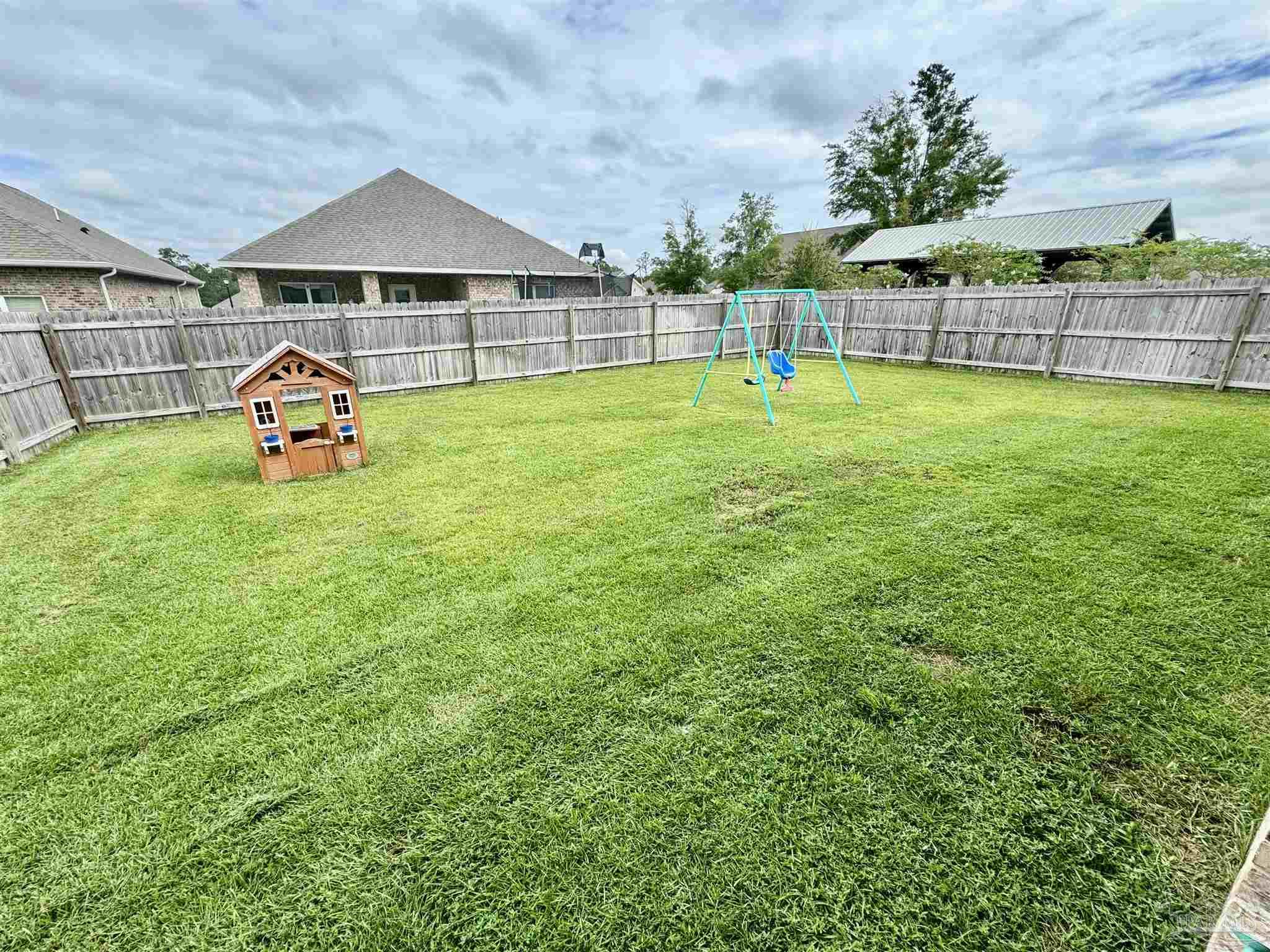 7787 Burnside Loop Pensacola, FL 32526 - Photo 26 of 32 a house view with a outdoor space