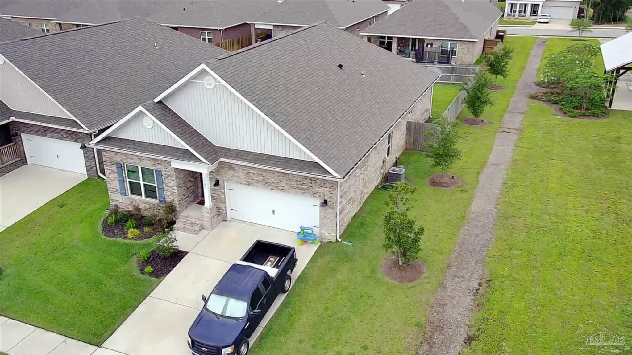7787 Burnside Loop Pensacola, FL 32526 - Photo 3 of 32 an aerial view of house with yard