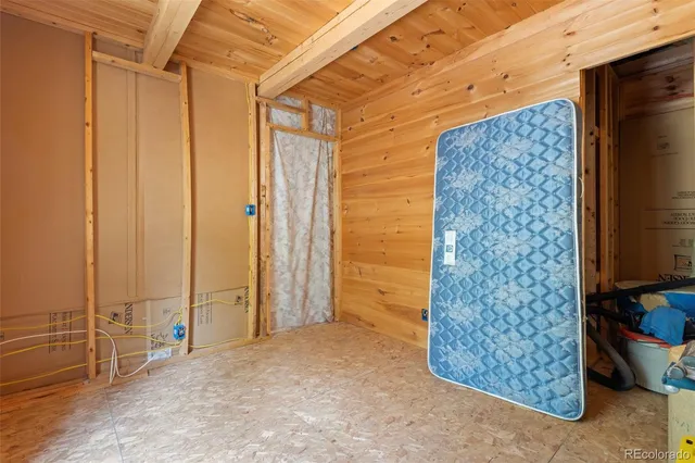 a backyard of a house with lots of green space and trees