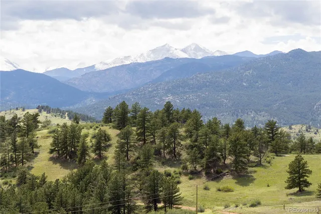 a view of a city with a mountain