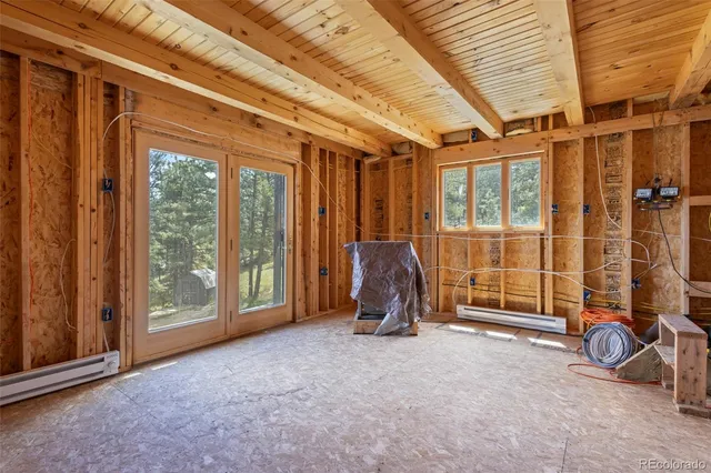 a view of livingroom with furniture and a window