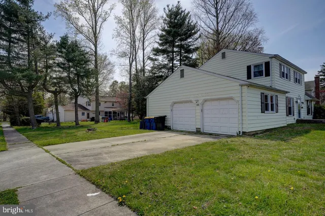 a view of a yard in front of a house