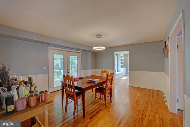 a room with a table and chairs