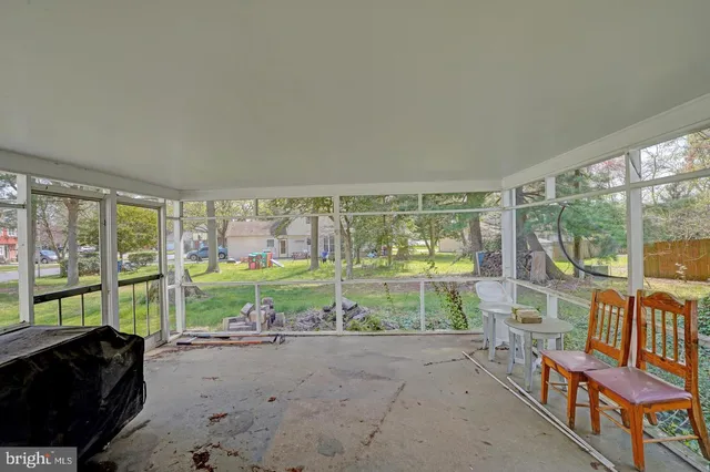a bathroom with a sink mirror and vanity