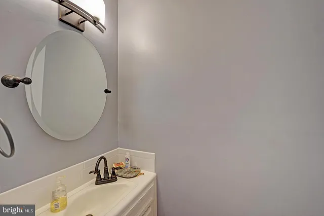 a kitchen with cabinets appliances and a window