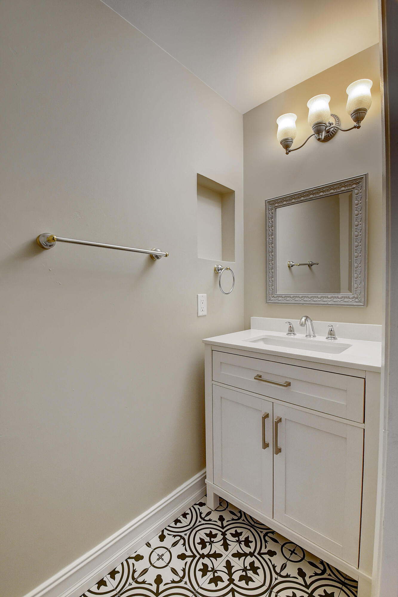 10599 Palm Spring Drive Boca Raton, FL 33428 - Photo 19 of 46 a bathroom with a sink mirror and vanity