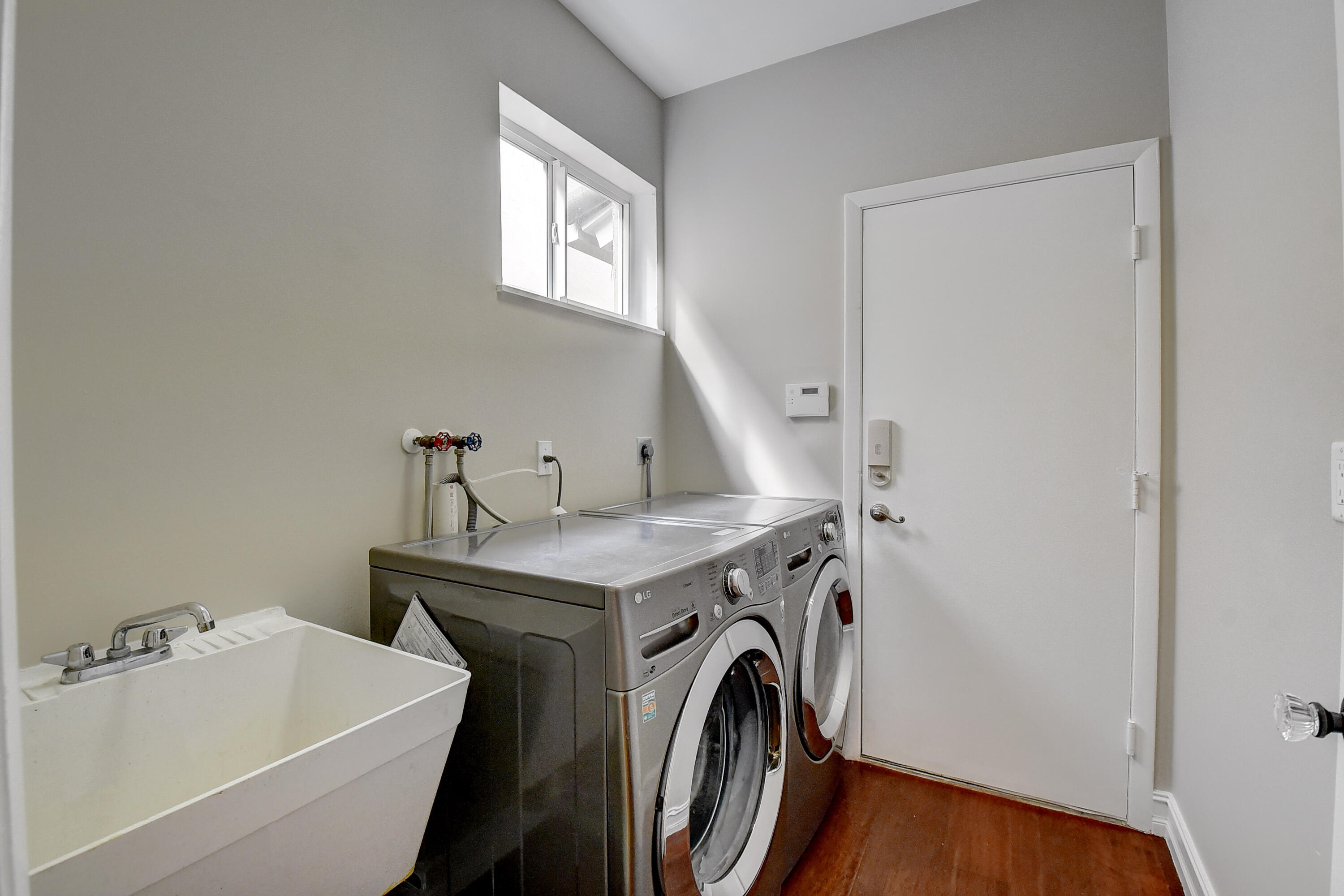 10599 Palm Spring Drive Boca Raton, FL 33428 - Photo 20 of 46 a utility room with dryer and washer