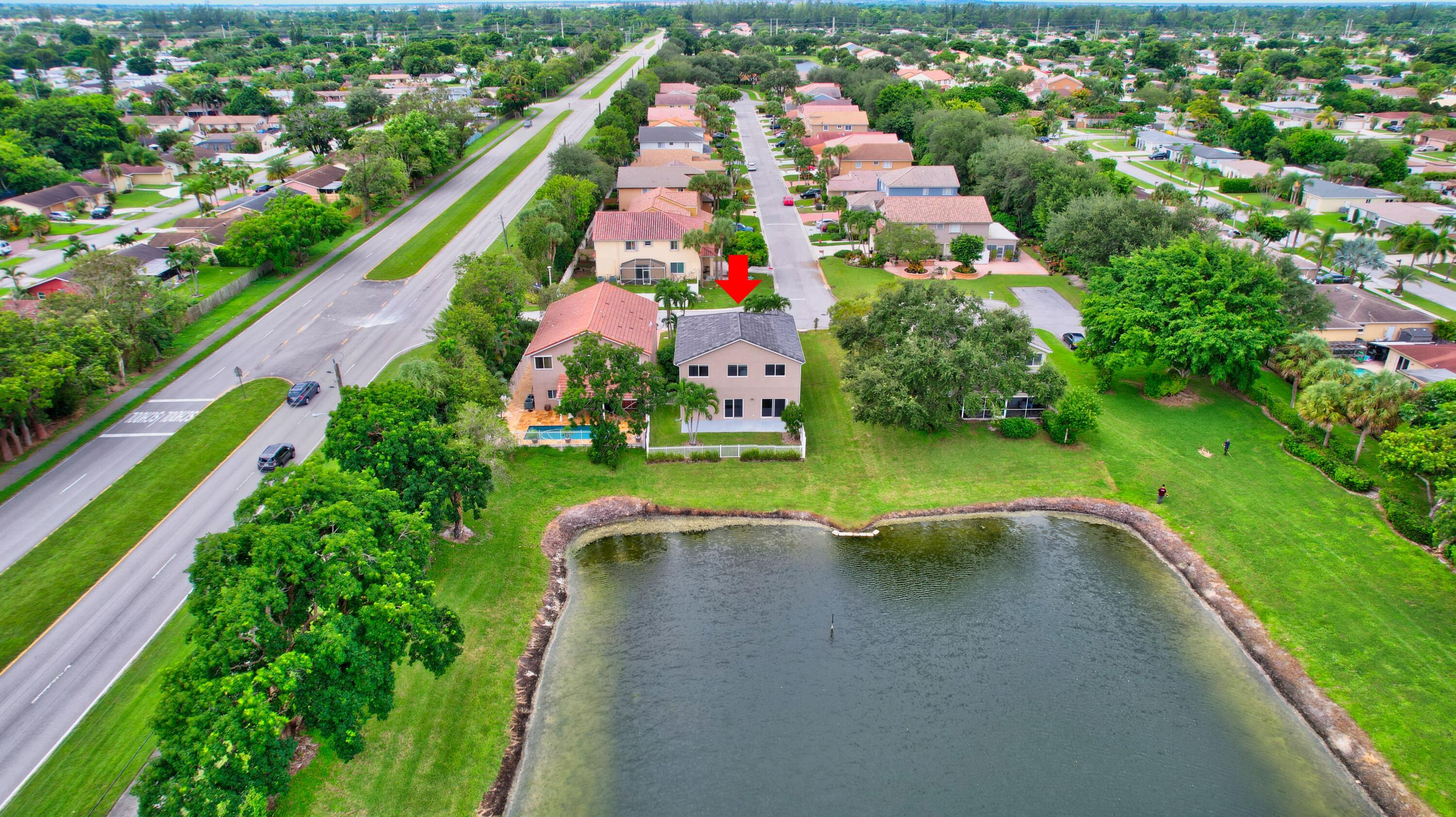 10599 Palm Spring Drive Boca Raton, FL 33428 - Photo 41 of 46 an aerial view of a city
