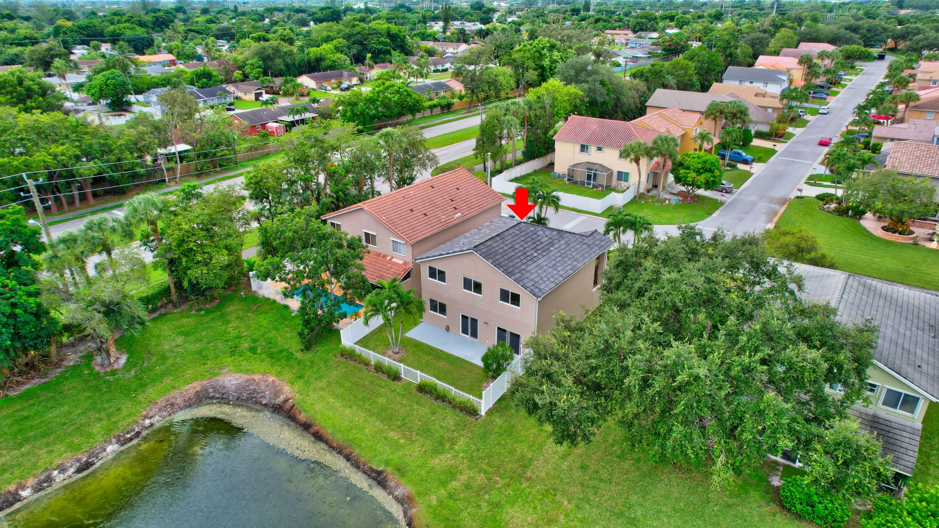 10599 Palm Spring Drive Boca Raton, FL 33428 - Photo 42 of 46 an aerial view of residential houses with outdoor space and street view