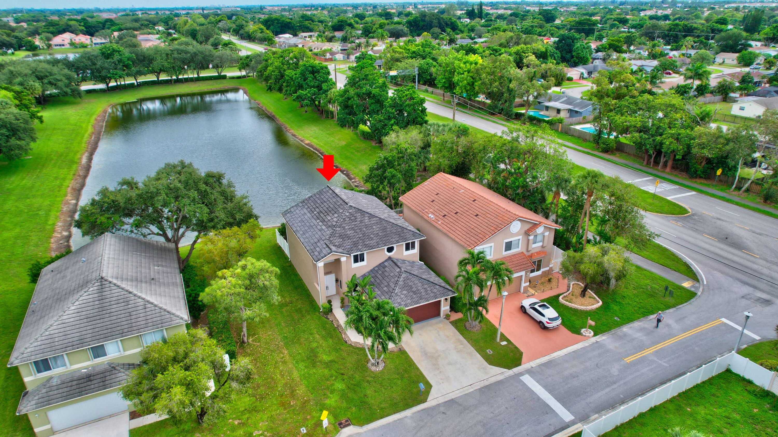 10599 Palm Spring Drive Boca Raton, FL 33428 - Photo 45 of 46 an aerial view of house with yard swimming pool and outdoor seating