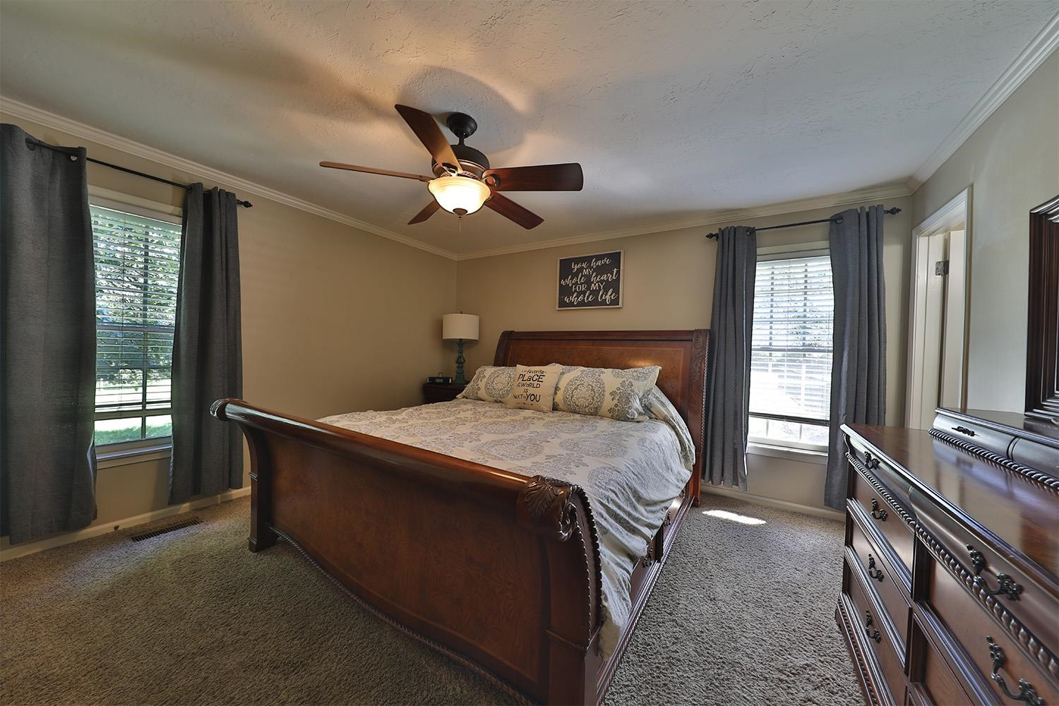529 Vancleave Road Martin, TN 38237 - Photo 13 of 20 a bedroom with a bed chandelier and a window