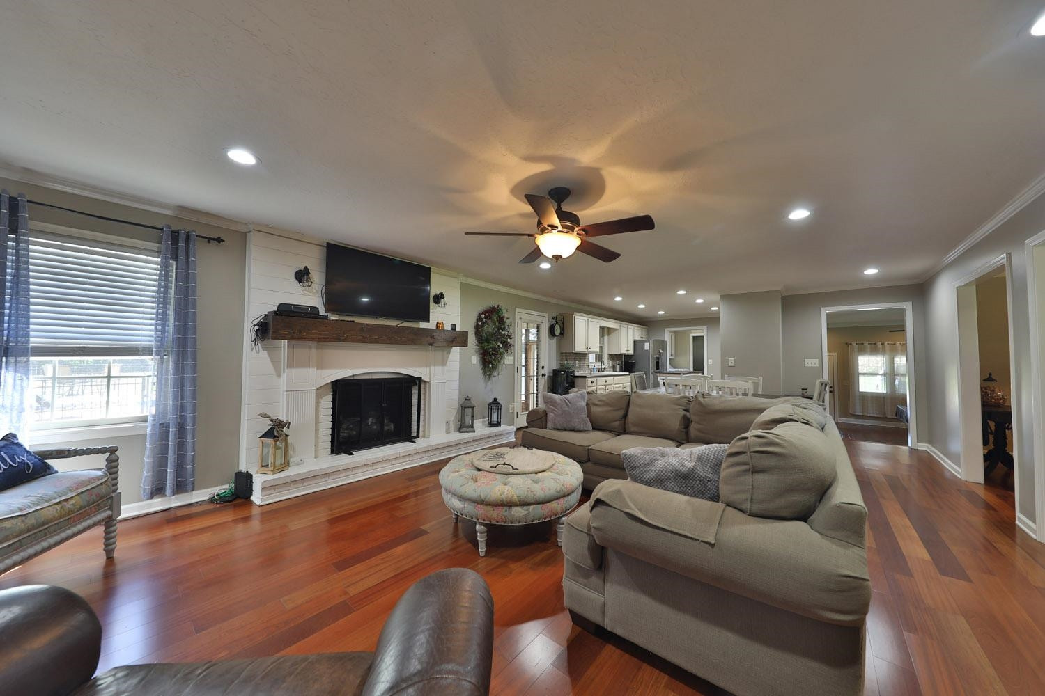 529 Vancleave Road Martin, TN 38237 - Photo 4 of 20 a living room with furniture a fireplace and a flat screen tv