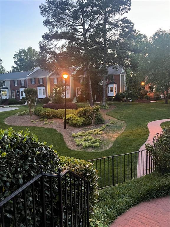 260 Manning Road Southwest, Unit 58 Marietta, GA 30064 - Photo 1 of 1 a view of a house with a yard