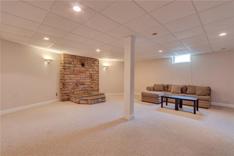 1473 Lovi Road Freedom, PA 15042 - Photo 18 of 22 A massive 22X22 lower level family room offers additional entertainment space.