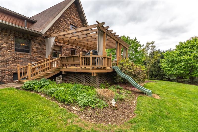 1473 Lovi Road Freedom, PA 15042 - Photo 21 of 22 A slide offers a whimsical touch to the deck.