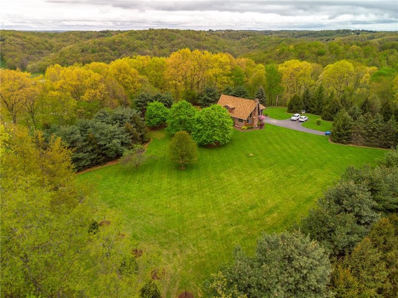 1473 Lovi Road Freedom, PA 15042 - Photo 22 of 22 Hidden away from the bustle of Cranberry, yet just 10 minutes away - your own 10+ acres to roam! Come See! Home Warranty offered for peace of mind.