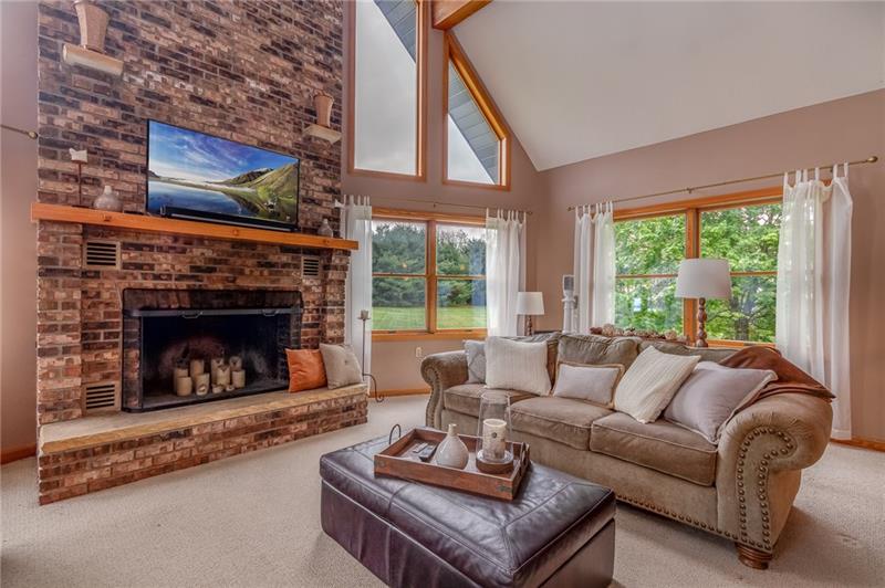 1473 Lovi Road Freedom, PA 15042 - Photo 5 of 22 Inspired use of windows & ceiling height compliment the room.